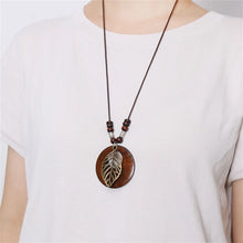 Load image into Gallery viewer, Vintage Wooden Owl Leaf Pendant Necklaces Boho Ethnic Style Metal Hollow leaves Necklaces Long Wax Rope Chain For Women Gifts
