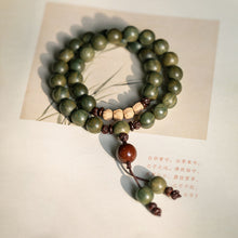 Load image into Gallery viewer, Old material green sandalwood Buddha beads bracelet female forest student sandalwood passion seed bracelet couple ethnic style
